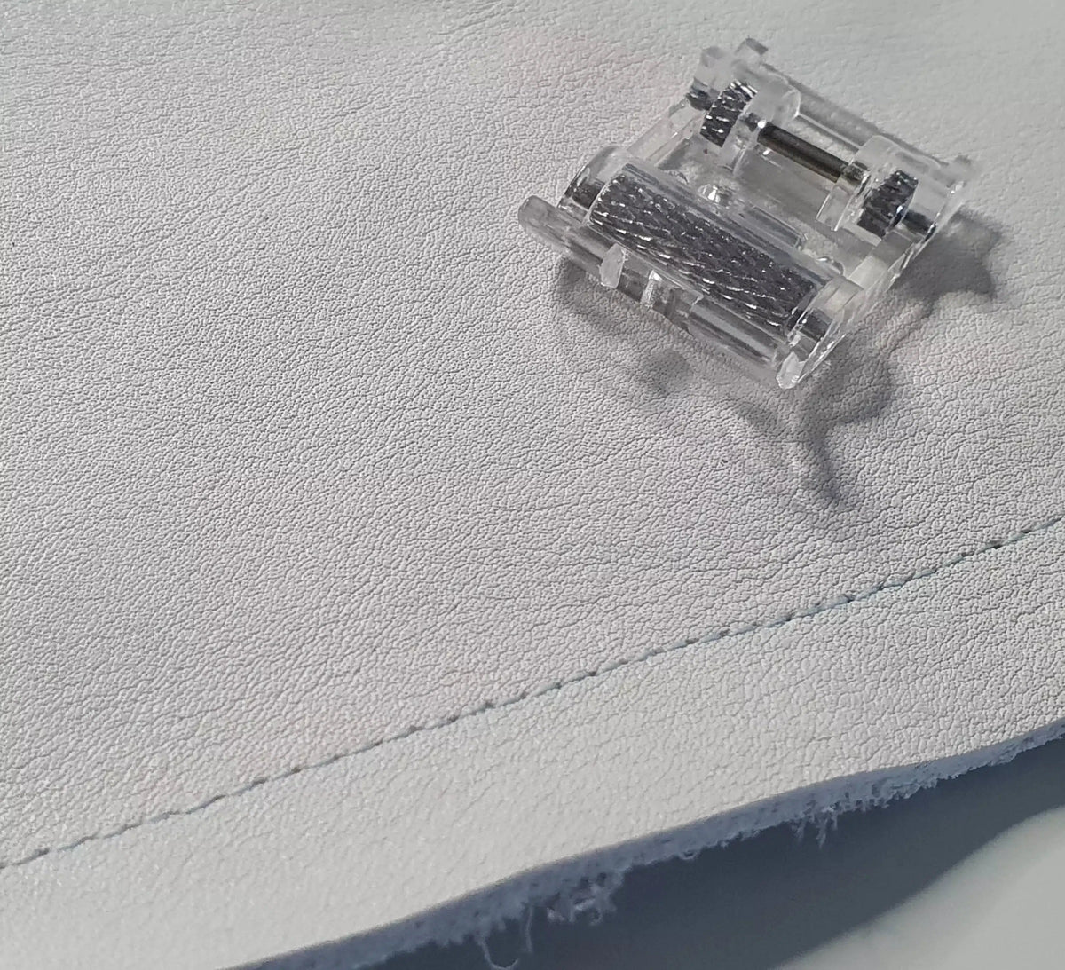 Pied presseur à rouleaux