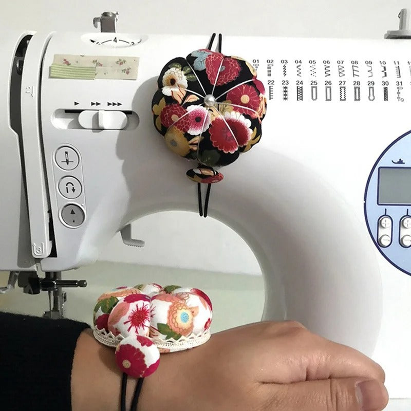 Cojín de muñeca para agujas con muñequera